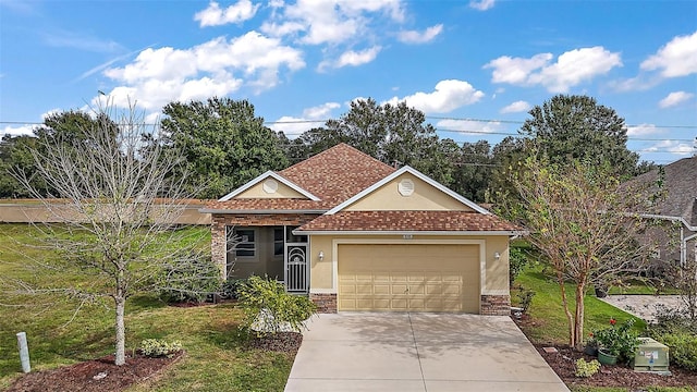 view of front of property with a garage