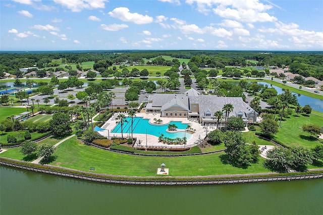 birds eye view of property with a water view