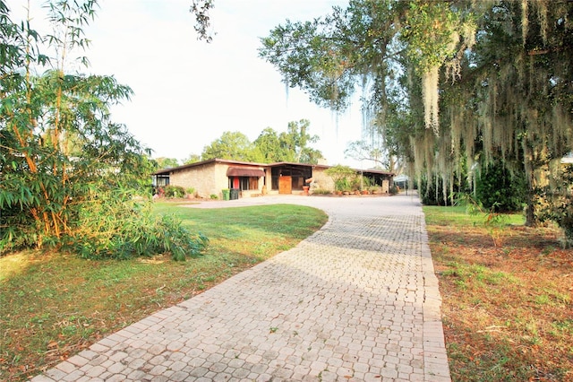 view of front facade with a front lawn