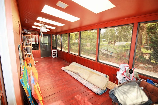 sunroom / solarium with a skylight