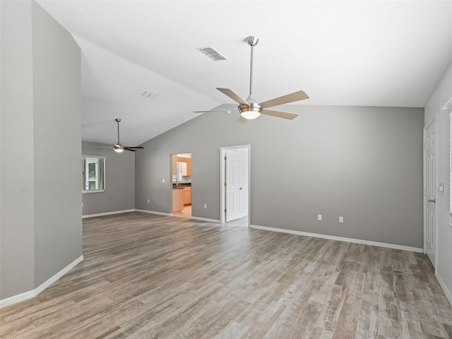 unfurnished living room with light hardwood / wood-style flooring, lofted ceiling, and ceiling fan