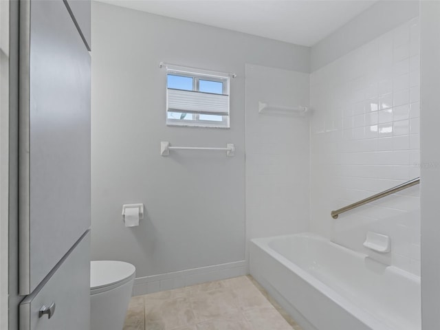 bathroom with toilet, bathtub / shower combination, and tile patterned flooring