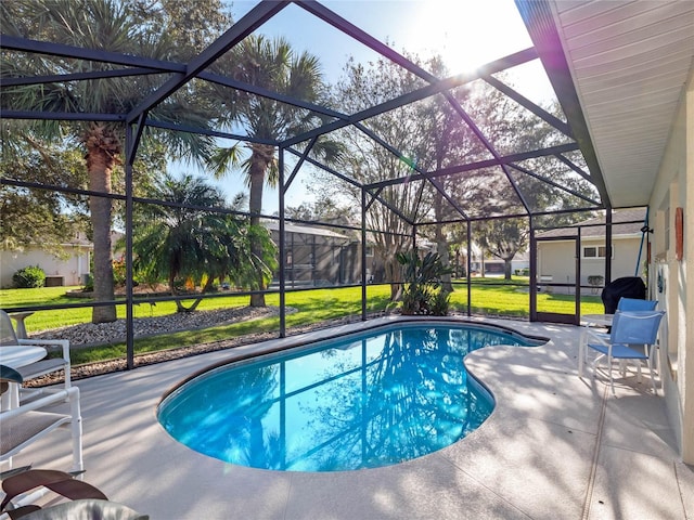 view of swimming pool with a lawn, glass enclosure, and a patio