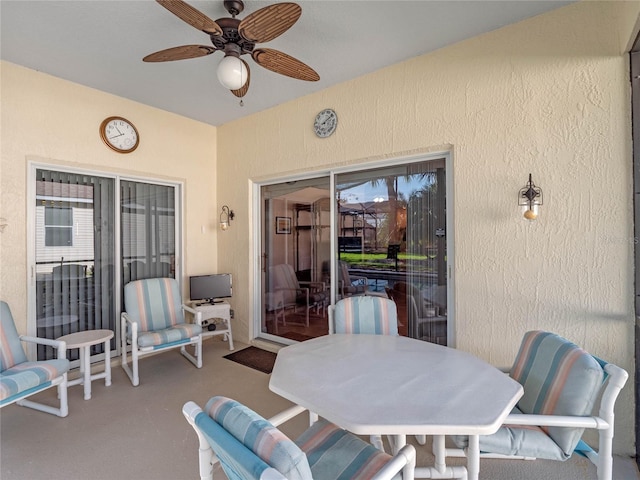 view of patio with ceiling fan