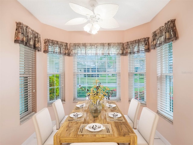 dining area with ceiling fan