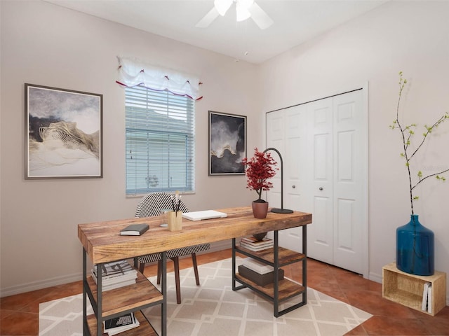 office area with tile patterned flooring and ceiling fan