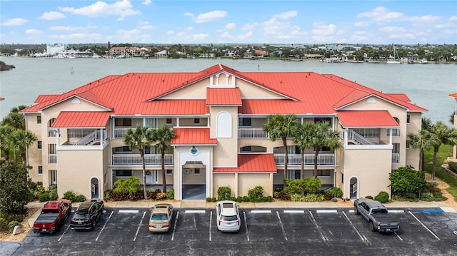 view of building exterior with a water view