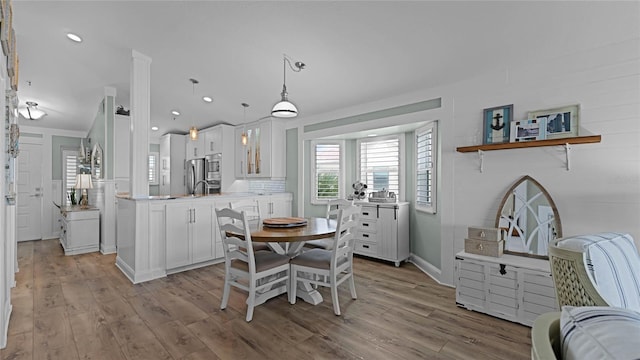 dining room featuring light hardwood / wood-style floors