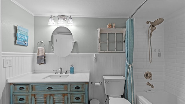 full bathroom featuring ornamental molding, shower / bath combo, toilet, and vanity