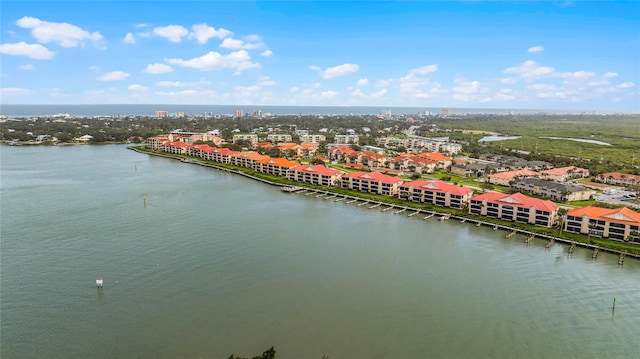 birds eye view of property featuring a water view