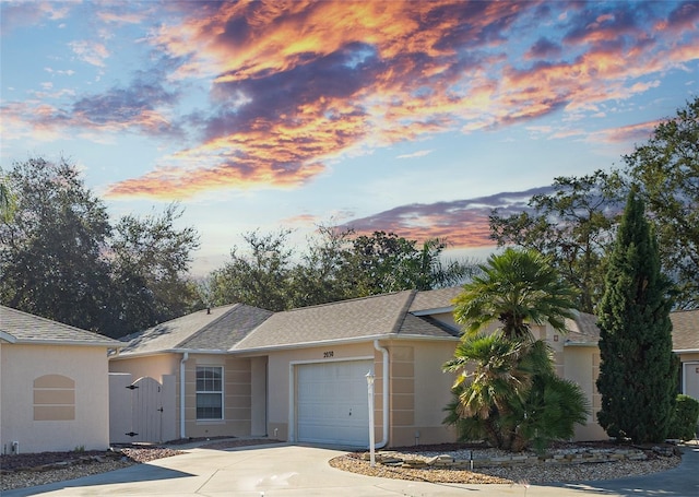 single story home with a garage