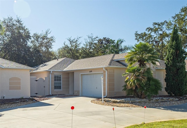 ranch-style home with a garage