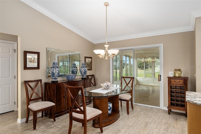 dining space with ornamental molding, light hardwood / wood-style floors, and lofted ceiling