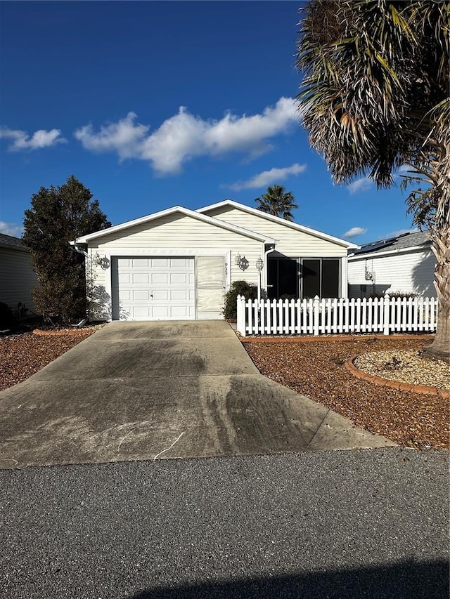 view of front of home featuring a garage