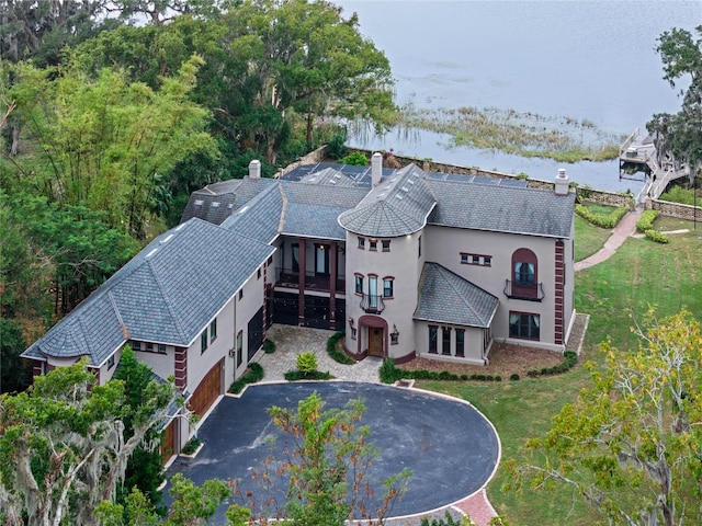 birds eye view of property featuring a water view