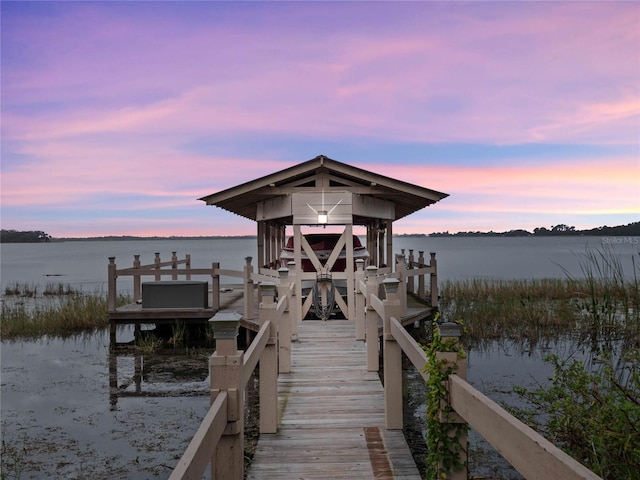 view of dock with a water view