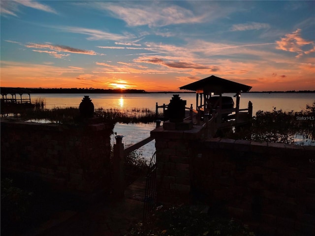 water view featuring a dock