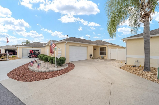 ranch-style house featuring a garage