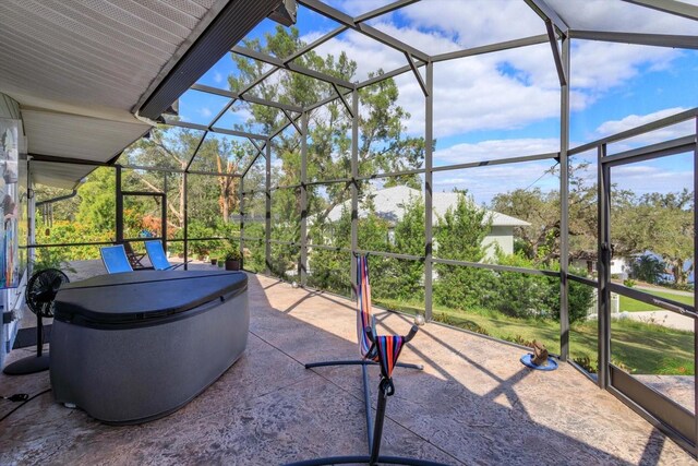 view of patio with a lanai