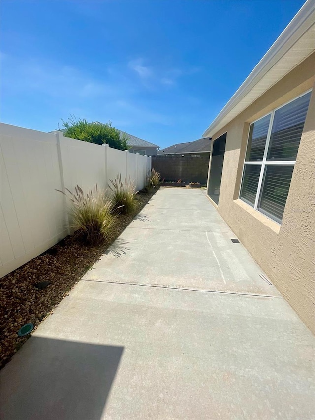 928 Nuthatch Ave, The Villages, FL 32163 - view of patio / terrace featuring a fenced backyard