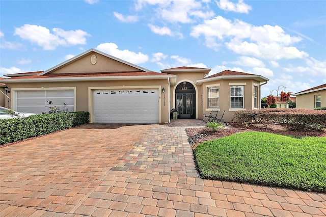 view of front of home featuring a garage