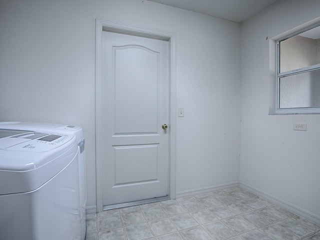 laundry room with washing machine and dryer