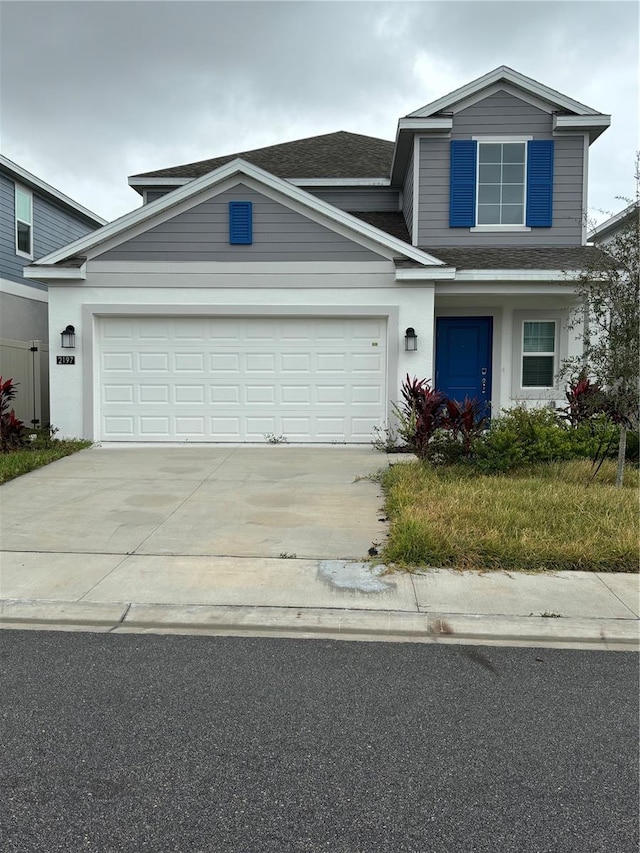 view of front property with a garage