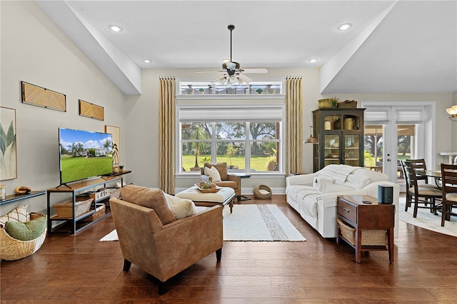 living room with dark hardwood / wood-style floors and ceiling fan