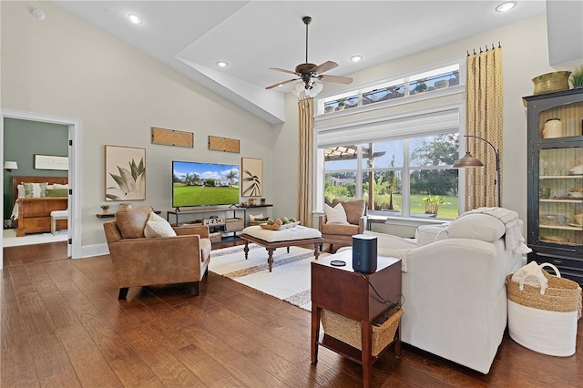 living room featuring high vaulted ceiling, ceiling fan, and dark hardwood / wood-style floors