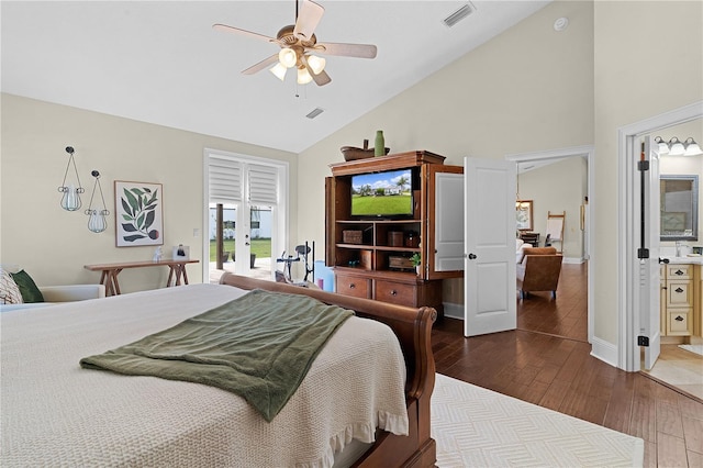 bedroom featuring french doors, high vaulted ceiling, dark wood-type flooring, ceiling fan, and ensuite bathroom