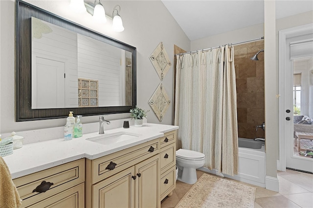 full bathroom with vanity, tile patterned floors, shower / bathtub combination with curtain, and toilet