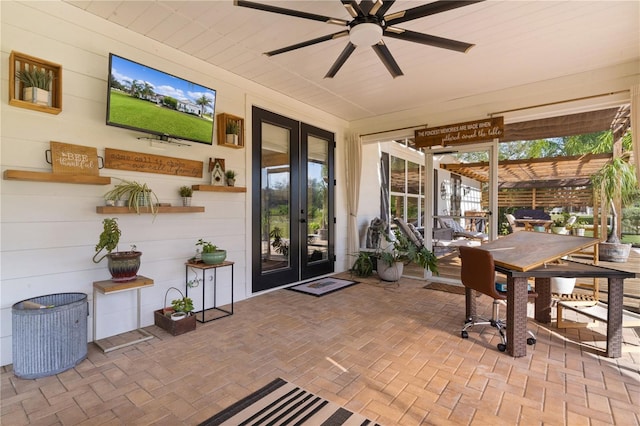 view of patio with french doors and ceiling fan