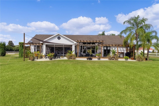 back of house with a sunroom, a yard, and a pergola