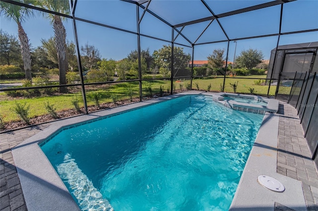 view of pool with glass enclosure and an in ground hot tub