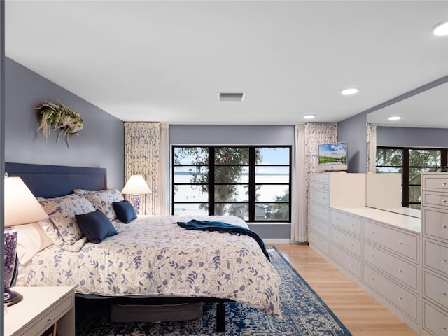 bedroom featuring light wood-type flooring