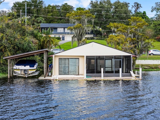 back of house with a water view