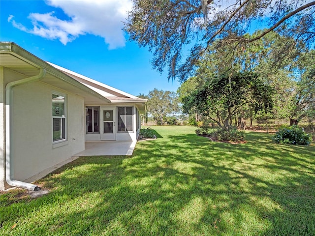 view of yard featuring a patio area