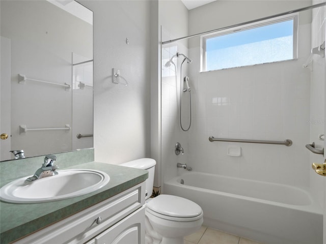 full bathroom with tile patterned floors, vanity, toilet, and tiled shower / bath