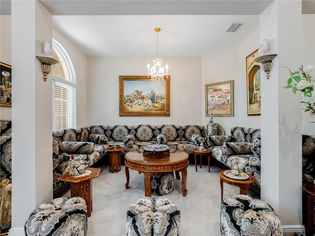 living room with a notable chandelier