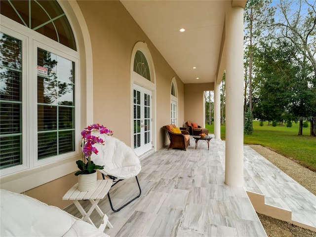 view of patio featuring an outdoor hangout area and french doors