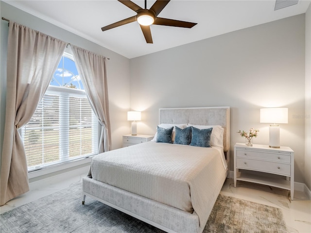 bedroom featuring ceiling fan