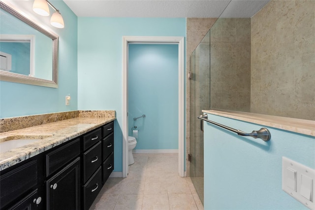 full bathroom with baseboards, a shower stall, toilet, and tile patterned floors