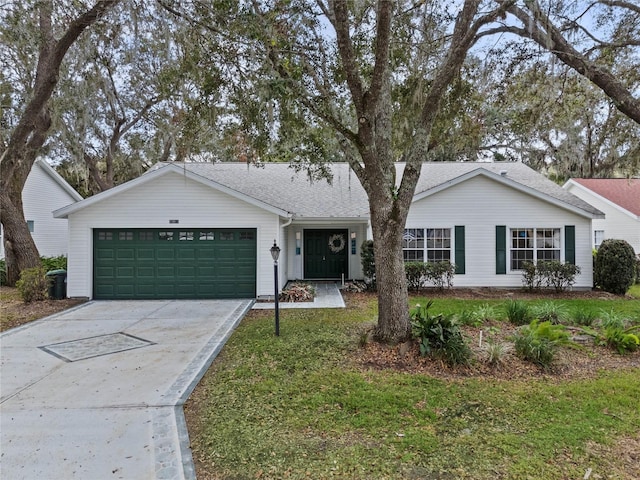 ranch-style house featuring a garage