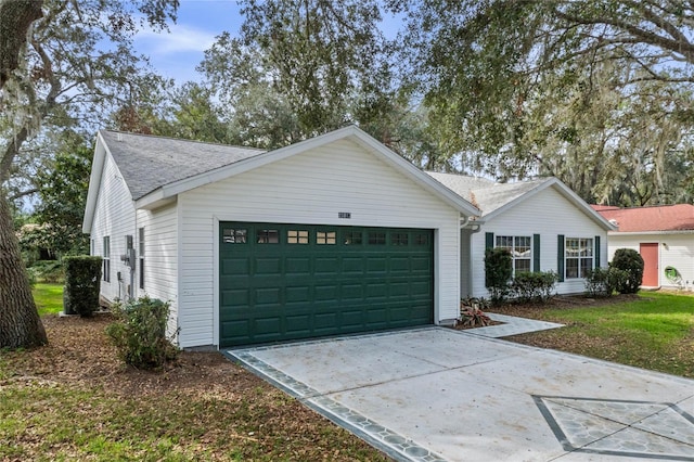 single story home featuring a garage