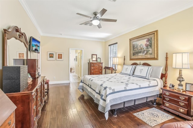 bedroom featuring ceiling fan, ornamental molding, dark hardwood / wood-style floors, and ensuite bathroom