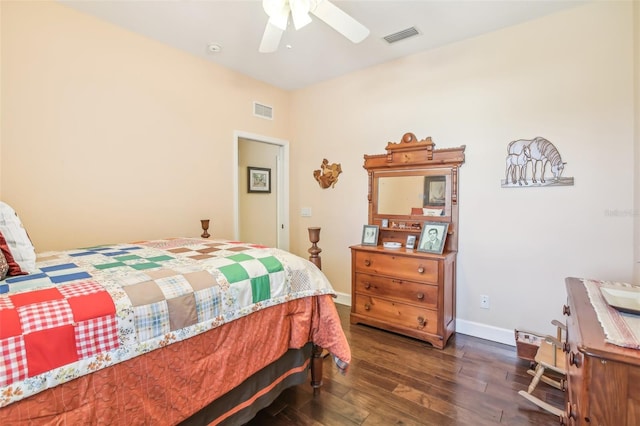 bedroom with dark wood-type flooring and ceiling fan