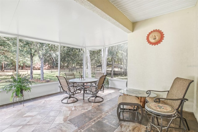 sunroom / solarium featuring a wealth of natural light