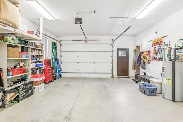 garage featuring water heater and a garage door opener