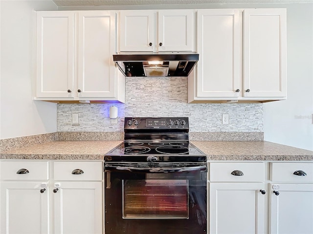 kitchen featuring electric range, white cabinetry, and backsplash