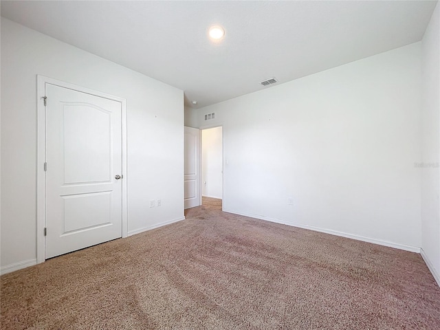 unfurnished bedroom featuring carpet